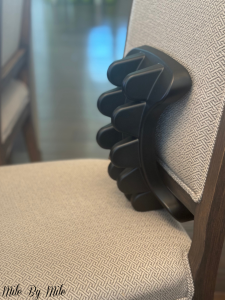 a photo of the pso-back being used on a chair